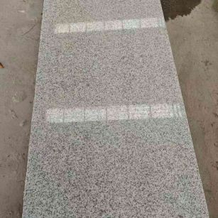 平凉芝麻白光面毛板