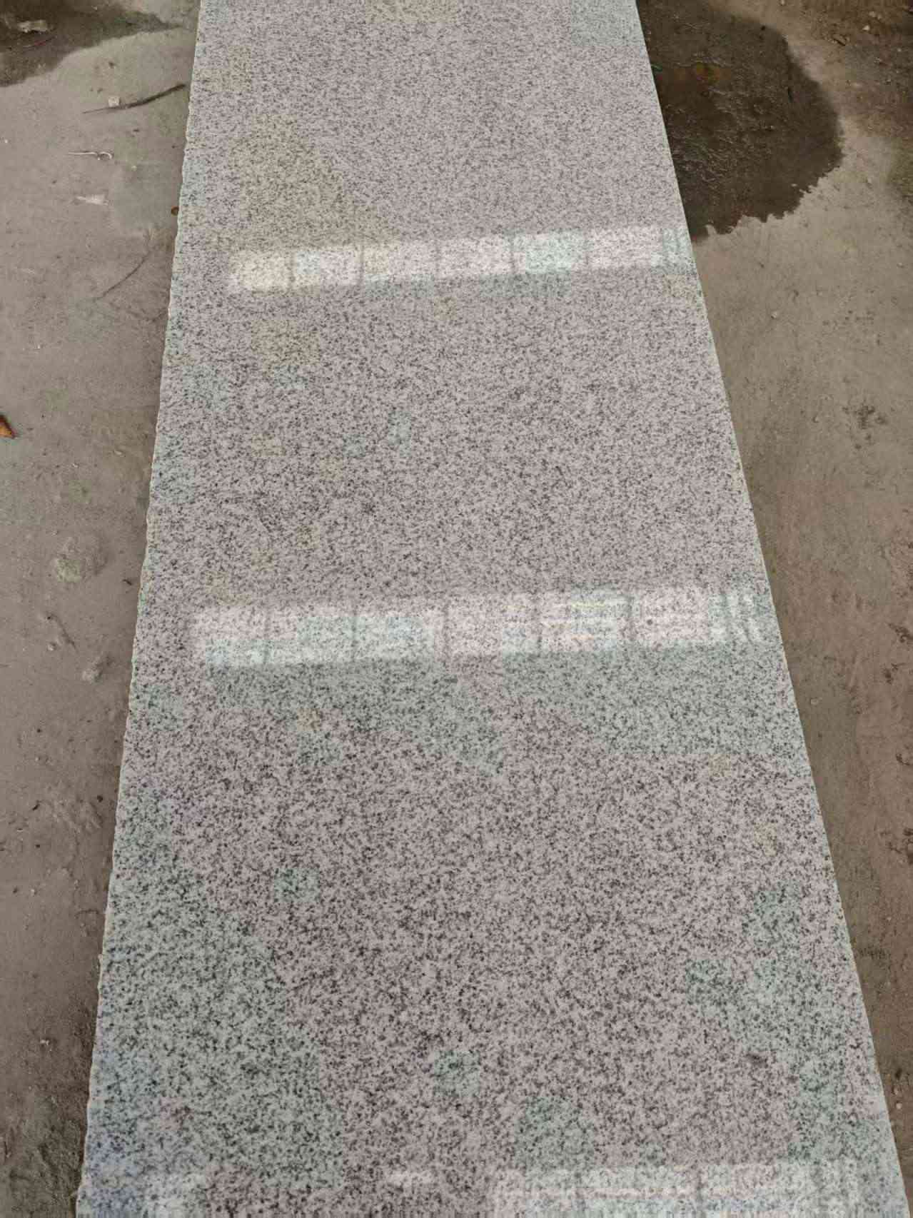 平凉芝麻白光面毛板